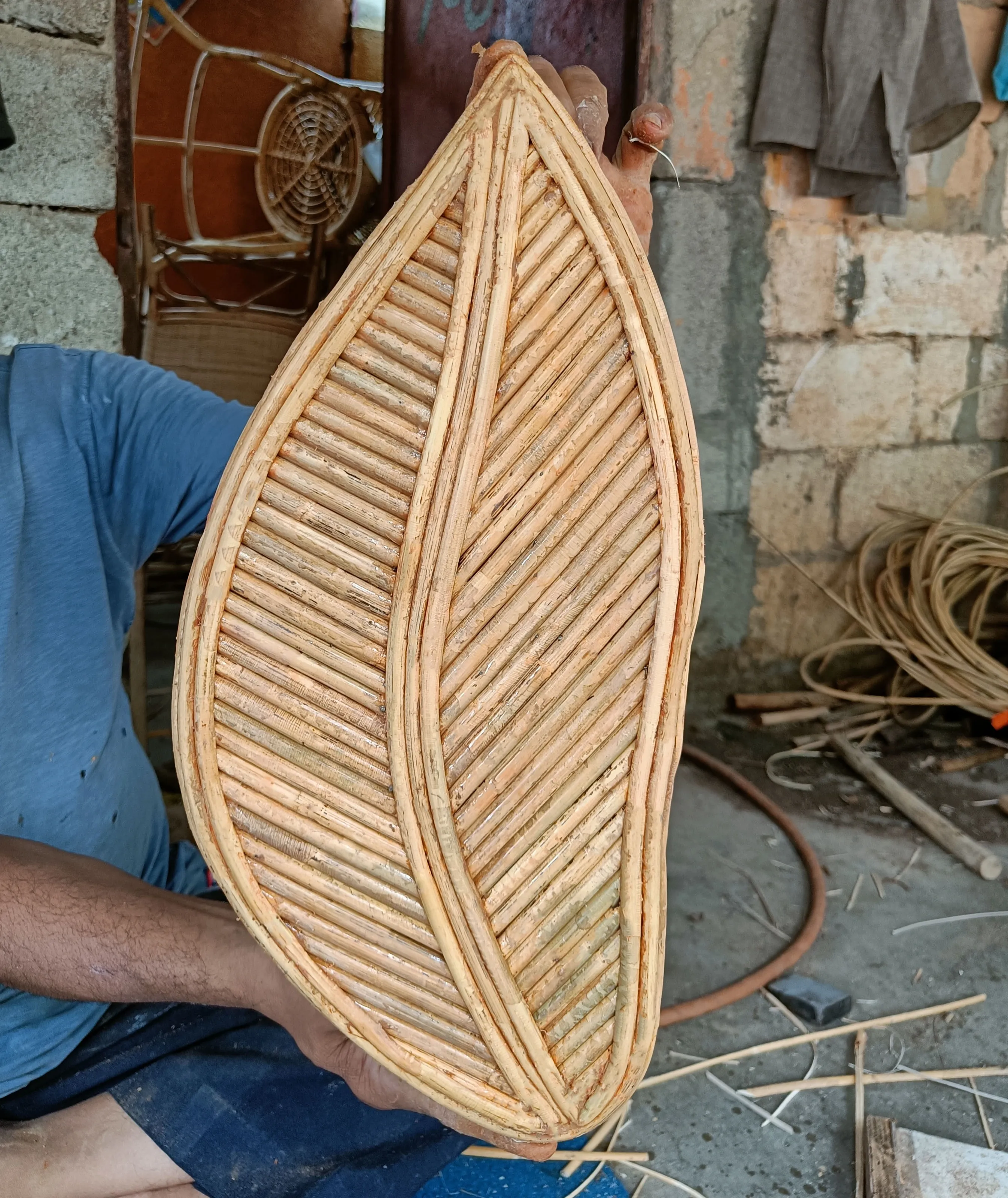 Hand-woven cane leaf component in progress, Malappuram